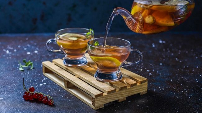 Homemade fruit and berry tea with mint.