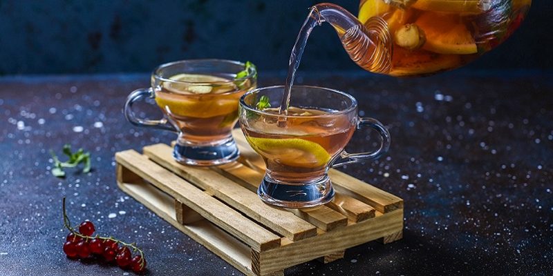 Homemade fruit and berry tea with mint.