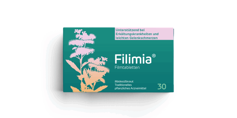 filimia-mockup.png Verpackung von Filimia Filmtabletten mit Pflanzenmotiven, unterstützt bei Erkältungen und Gelenkschmerzen.