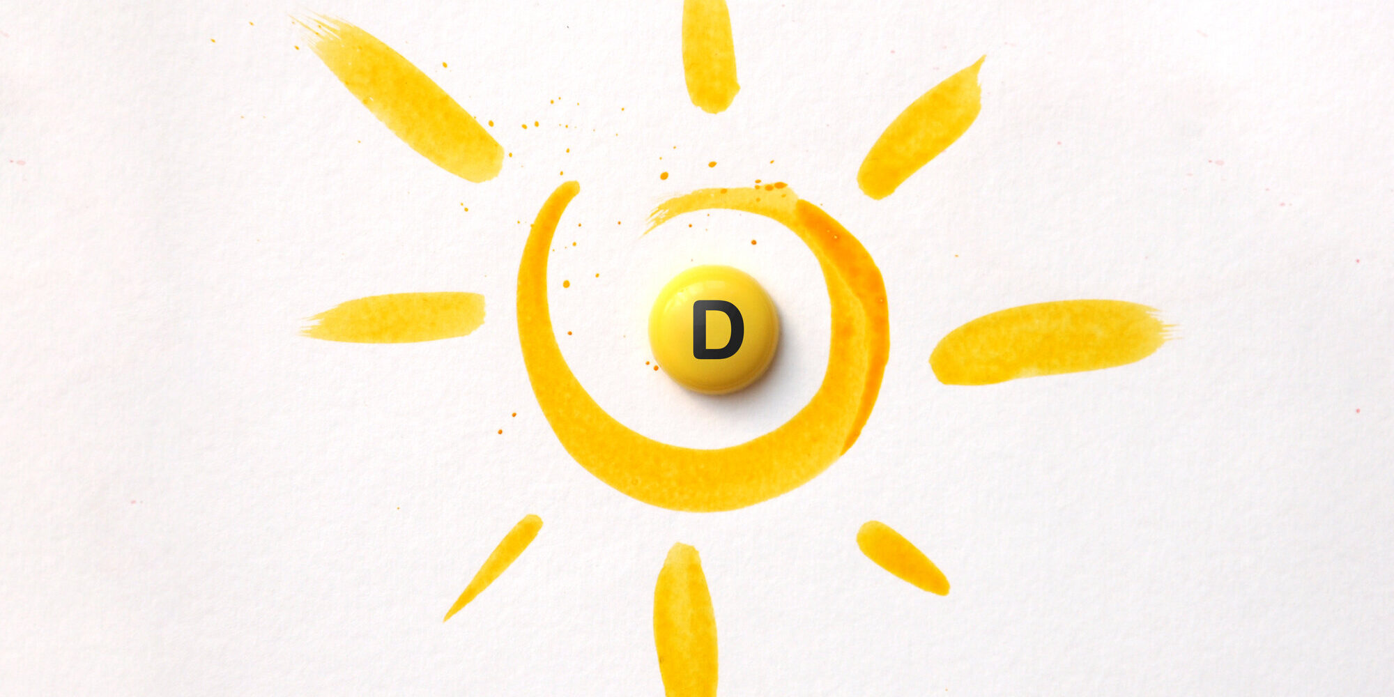Gelbe Malerei eines Sonnenmotivs mit einer runden, gelben Pille mit dem Buchstaben D in der Mitte.